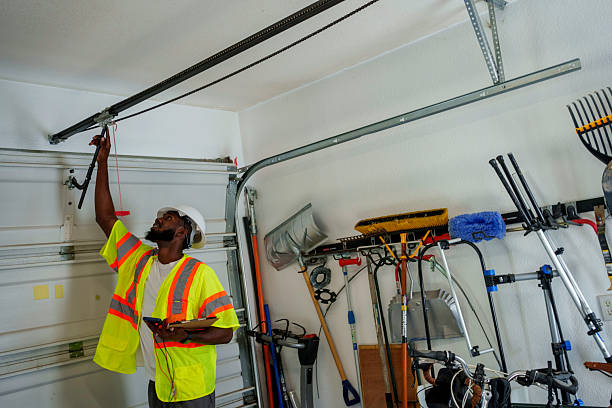 Professional Garage Door technician working in Flora, MS